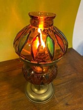 old glass and copper kerosene