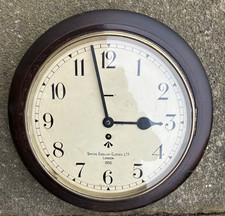VINTAGE MILITARY SMITHS BROAD ARROW MARKED 12" DIAL WALL CLOCK  LONDON 1950.