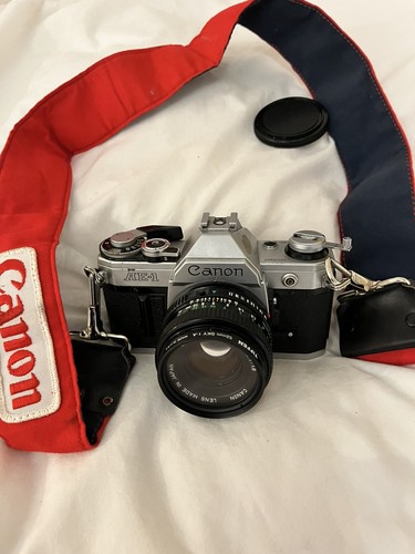 Canon 35mm film slr - ae-1,