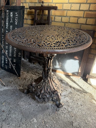 Very ornate iron table - ornate,
