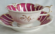 ANTIQUE ROCKINGHAM TEA CUP &