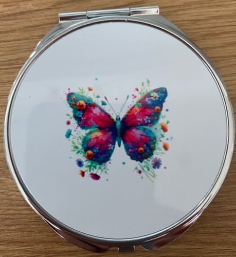 Butterfly compact mirror