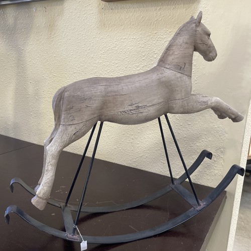 Rocking woodhorse hanging on - rocking,