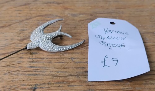 Vintage swallow badge