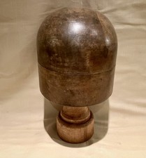 An Antique Wooden Hat Block On Stand