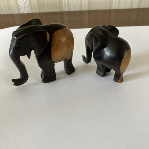 Two hand carved wooden - two,