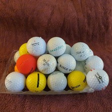 40 used golf balls