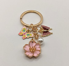 Gold tone Pink flower keychain with mini butterfly charms