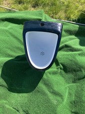 Urinal In Black Some On The Black Is Coming Off With Fittings