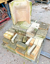 Clay fire back with selection of firebricks and air bricks Various sizes