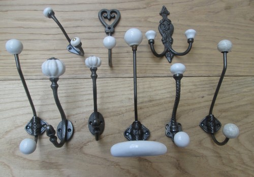 Antique iron coat hooks - coat,