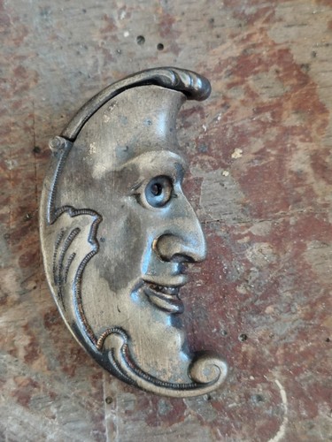 Antique brass man - in, moon