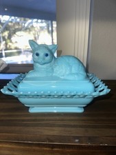 Blue White Slag Cat On Nest