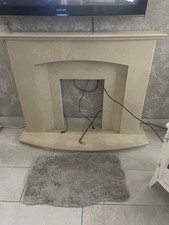 Marble Fireplace And Electric Stove