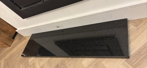 Black granite fireplace - granite,