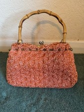 Raffia woven handbag with