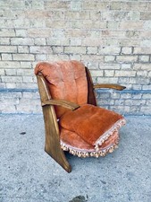 A Liberty & Co. upholstered low chair by William Birch & co.