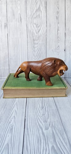Hand carved wooden lion - hand,