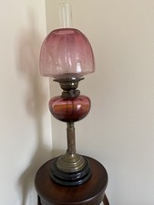 Cranberry Glass Late Victorian Oil Lamp with Brass Column & Black Glazed Base