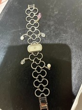 A LADIES ROTARY BRACELET WATCH WITH FANCY STONES.