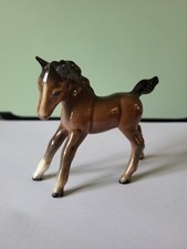 A SMALL BESWICK BROWN