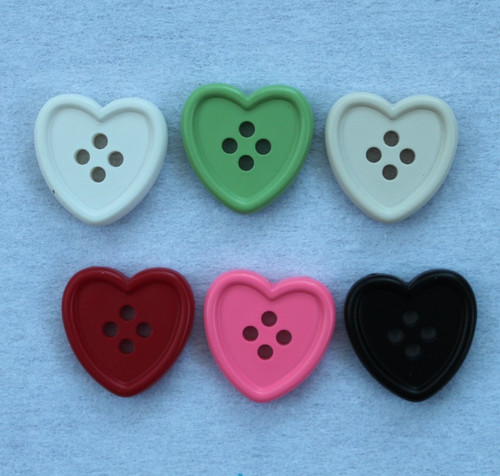 Four hole large 23mm heart - x,