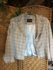 Ladies boucle check fringed