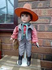 Porcelain Cowboy Doll In