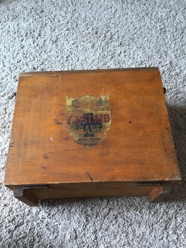 Vintage wooden first aid - first,