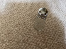 vintage sugar shaker in glass and silver plate. Excellent condition.