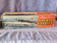 VINTAGE AIRCRAFT CARRIER TOY WITH FLYING HELICOPTER AND BOX MADE IN GB