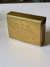 A Victorian brass presentation table snuff box