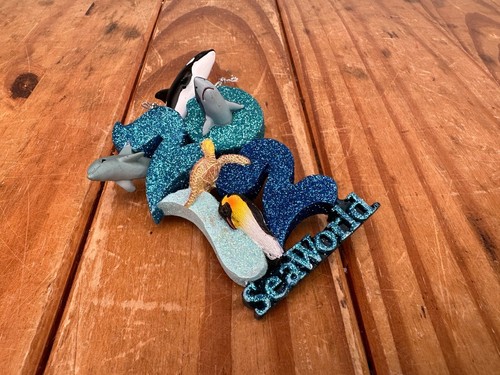 Seaworld glitter logo - seaworld,