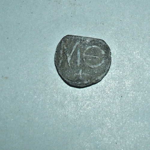 Medieval lead token with - lead,