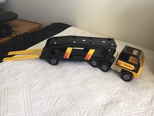 Large black yellow orange car