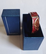 Faux pearl and metal bangles