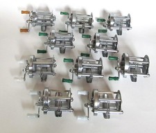 Collection of 10 Vintage Pflueger Level Wind Bait Casting Reels Inc. 3 Summits