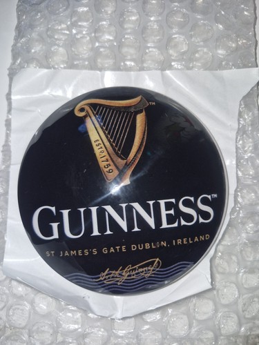 Guinness round fish - round, beer