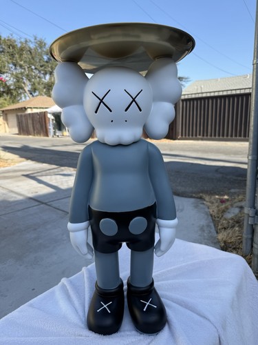 Kaws resin figure with tray - ,
