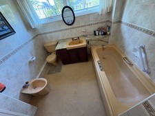 1970s Armitage Shanks bathroom suite including bath, toilet, sink and bidet. 