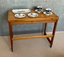 Mcintosh 1960/70’s Teak Side Table with fold over extendable top on castors