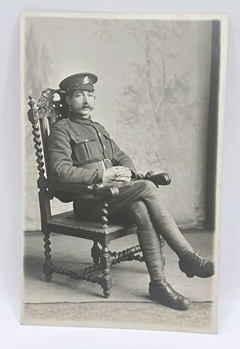 Postcard seated man - postcard:,