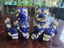 A Pair Of Vintage Chinese Foo Dog Figurines blue (one has damaged ear)