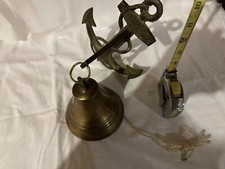 Brass Ship Bell Mounted To An