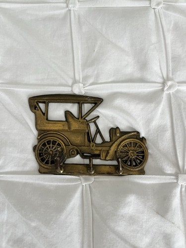 Vintage solid brass model car