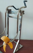 Hand operated outboard - operated,
