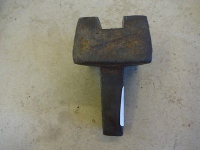 Bottom slot swage stake