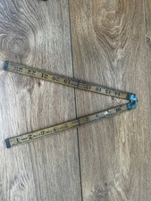 vintage wooden and metal folding inch ruler