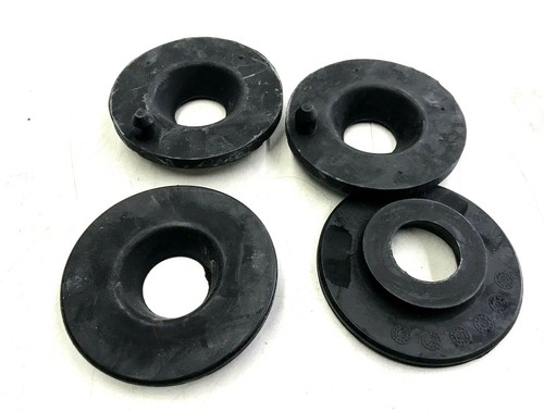 Rear coil spring mounts - rear,
