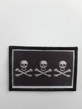 Triple skull and crossbones - triple,